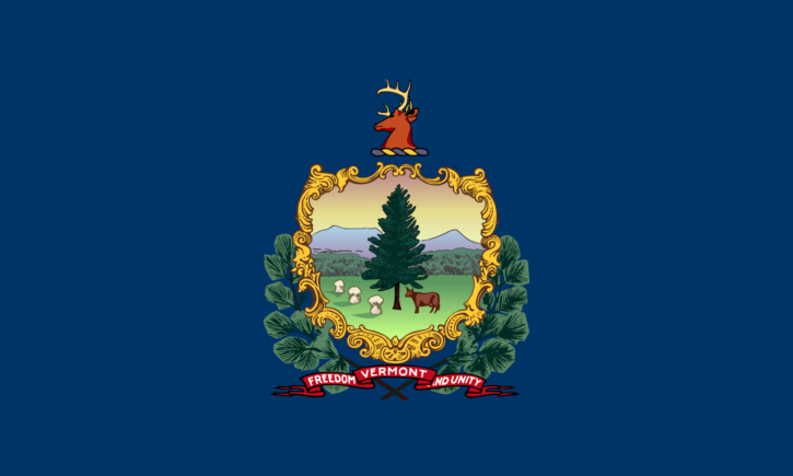 Vermont Flag displays the coat or arms and motto of the U.S. state of Vermont ("Freedom and Unity) on a rectangular blue background.